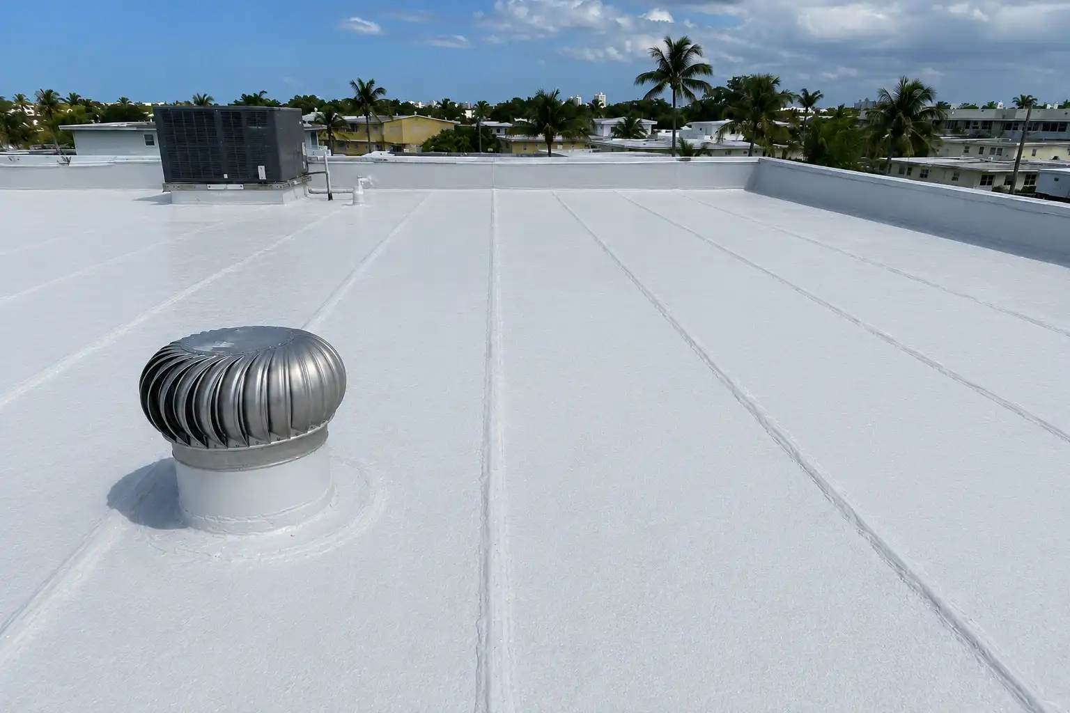 The same roof treated, sealed, and finished with a reflective coating